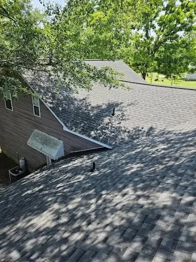 Shingle roofing across a home with several connected roof slopes